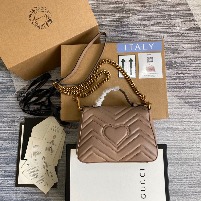 Front view of refined sleek women's handbag – women's everyday handbag