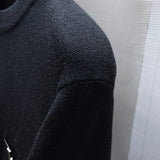 Back view of Louis Vuitton luxury clothing with relaxed-fit cut