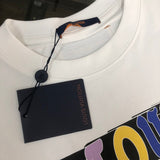 Full styled look of Louis Vuitton cotton t-shirt with label-forward styling