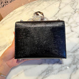  structured top-handle bag styled with outfit 12