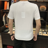 Back view of Moncler luxury clothing with tailored silhouette