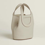 Side view of timeless structured handbag
