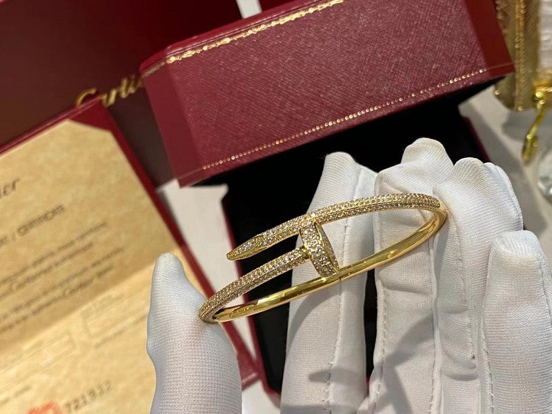 Side view of Cartier unisex jewelry piece