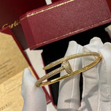 Side view of Cartier unisex jewelry piece