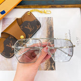 Angled view of Louis Vuitton unisex sunglasses