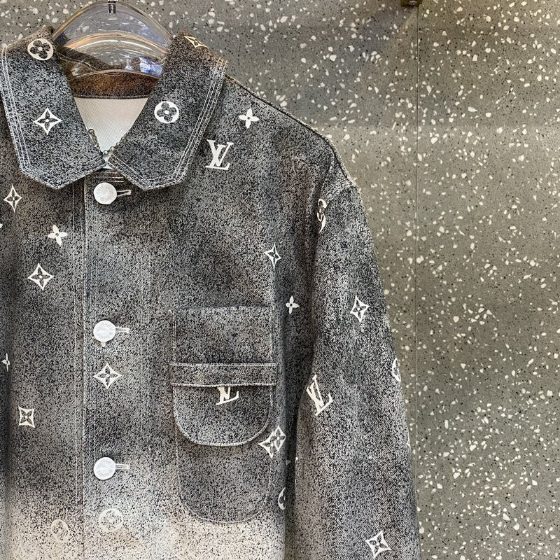 Flat lay presentation of Louis Vuitton luxury clothing with monogram-inspired silhouette