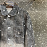 Flat lay presentation of Louis Vuitton luxury clothing with monogram-inspired silhouette