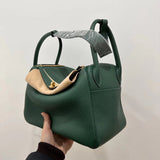 Side view of elegant structured handbag