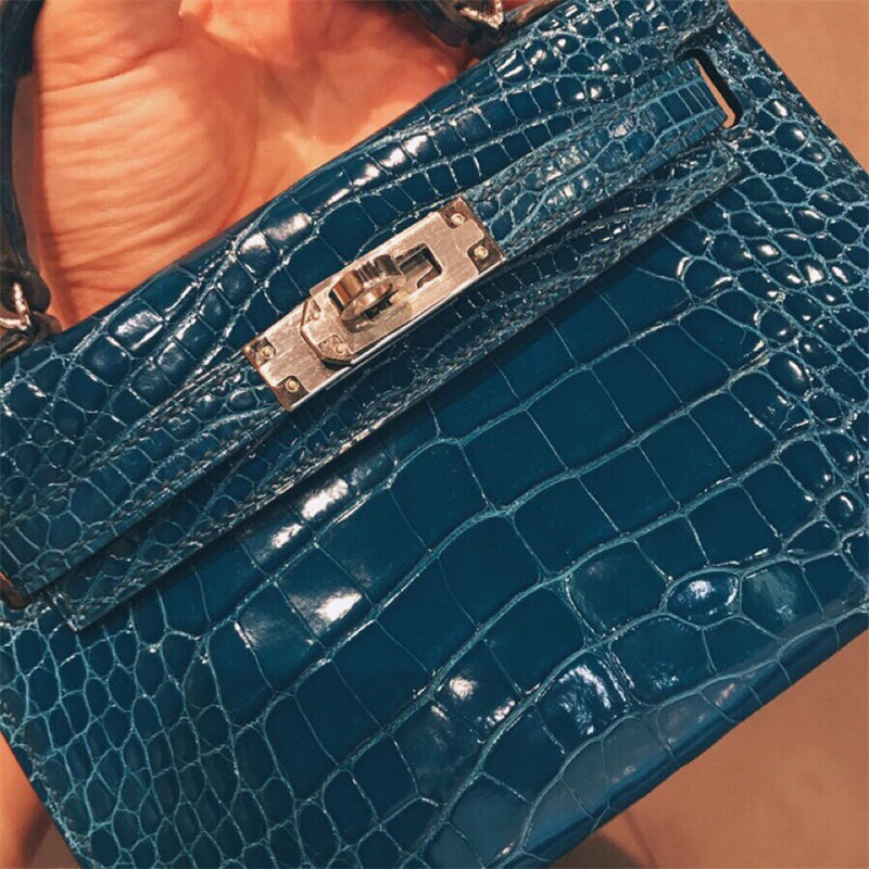  Understated shoulder bag carried on shoulder 10