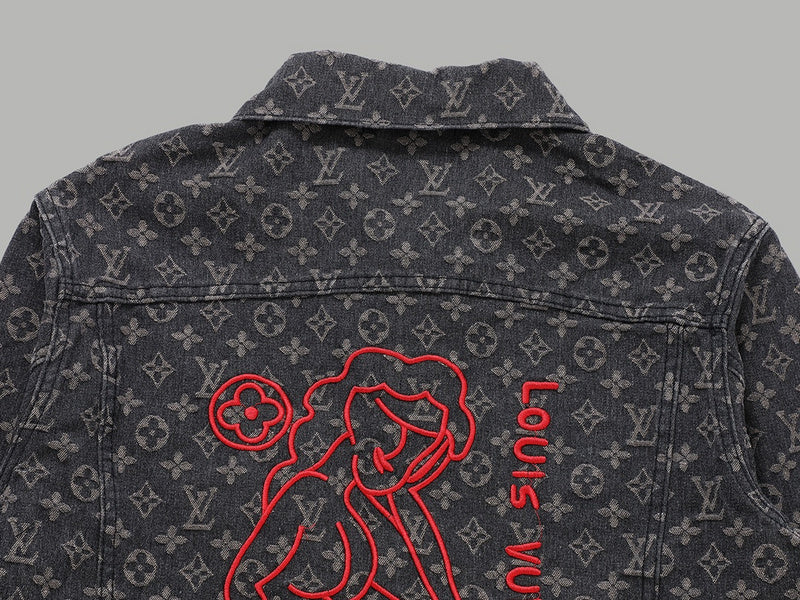 Flat lay presentation of Louis Vuitton luxury clothing with signature branding