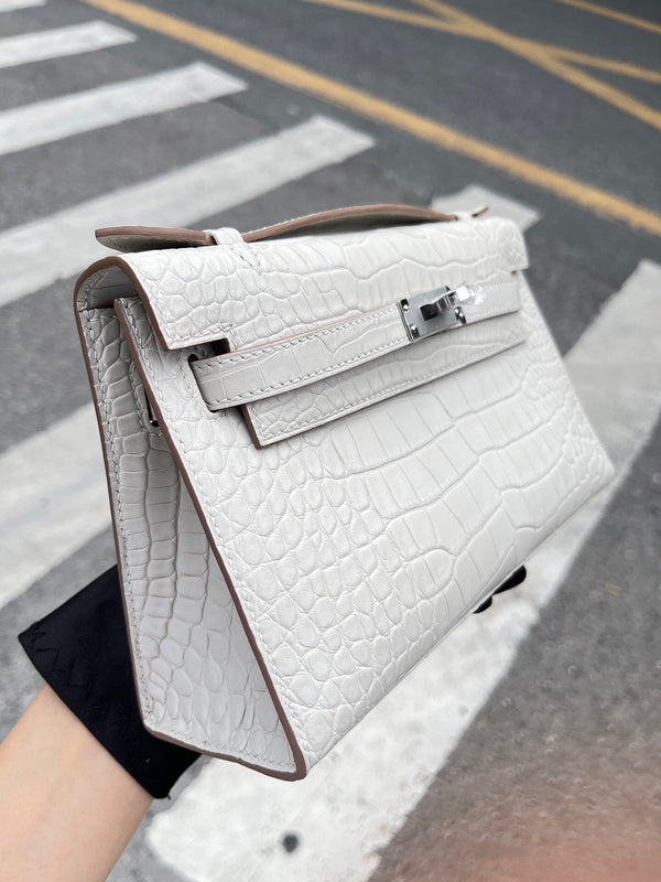 Side view of polished structured handbag