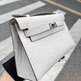 Side view of polished structured handbag