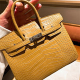  clean-lined crossbody bag styled with outfit 42