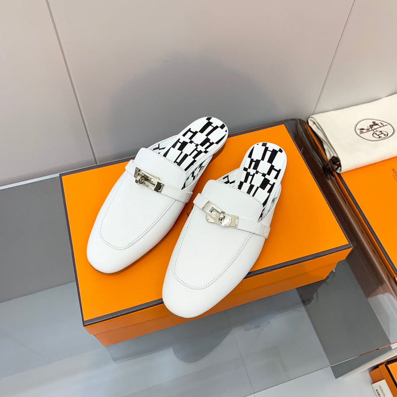 Hermès White Slide Sandals - Angled View