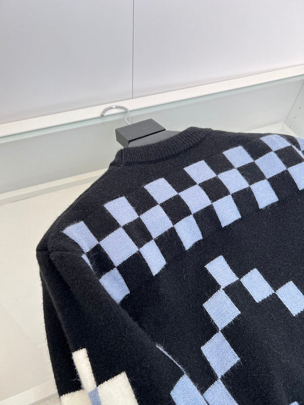 Close-up detail shot of Louis Vuitton luxury clothing with contemporary cut