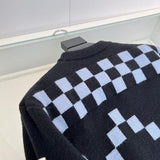 Close-up detail shot of Louis Vuitton luxury clothing with contemporary cut