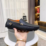 Hermès Tan High-Top Sneakers - Angled View