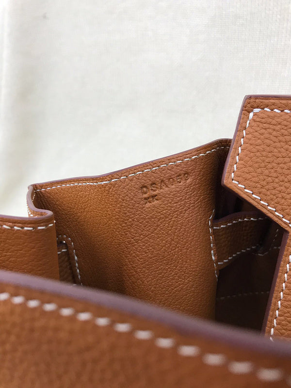 Side view of considered structured handbag