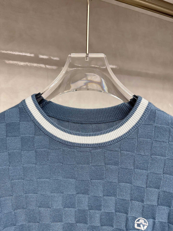 Full styled look of Louis Vuitton luxury clothing with signature branding