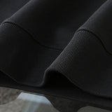 Close-up detail shot of Gucci luxury clothing with tailored silhouette
