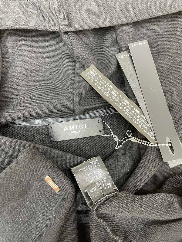 Texture and finish detail of Amiri luxury piece style No.048