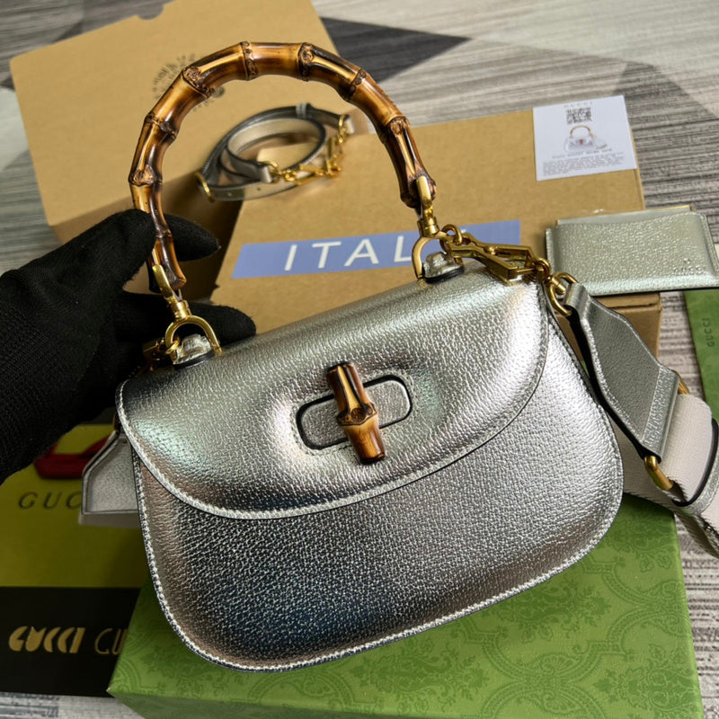 Front view of refined sleek women's handbag – women's luxury handbag