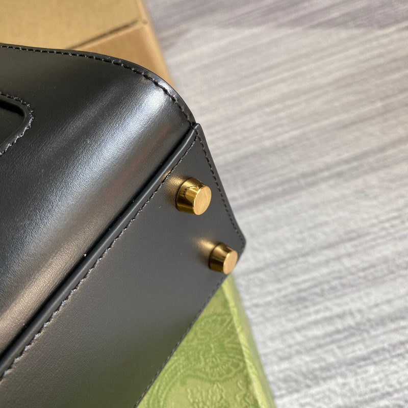 Styled lifestyle shot of elevated classic women's handbag – women's designer-style accessory