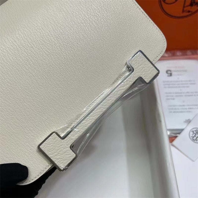 Side view of minimalist structured handbag