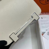 Side view of minimalist structured handbag