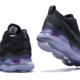 Side profile of Nike classic monochrome sneakers cushioned comfort fit