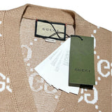 Flat lay presentation of Gucci luxury clothing with monogram-inspired silhouette
