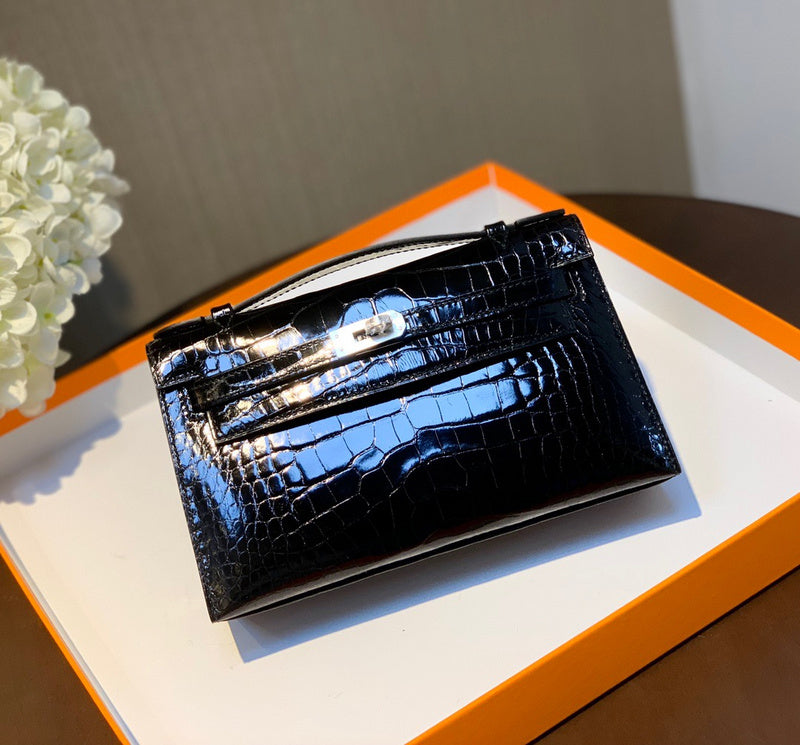 Side view of clean-lined structured handbag