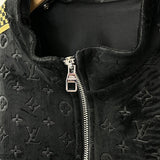 Close-up detail shot of Louis Vuitton luxury clothing with streetwear-inspired cut