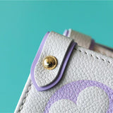  chic top-handle bag styled with outfit