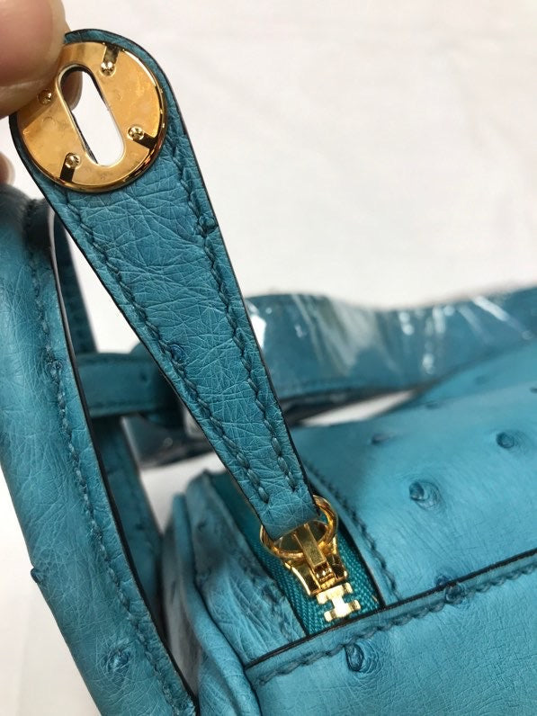 Side view of curated structured handbag