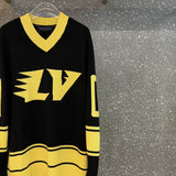 Front view of Louis Vuitton luxury clothing with contemporary cut
