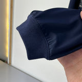 Front view of Louis Vuitton luxury clothing with label-forward styling