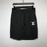 Full styled look of Louis Vuitton cotton t-shirt with label-forward styling