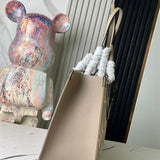  Signature shoulder bag carried on shoulder 22