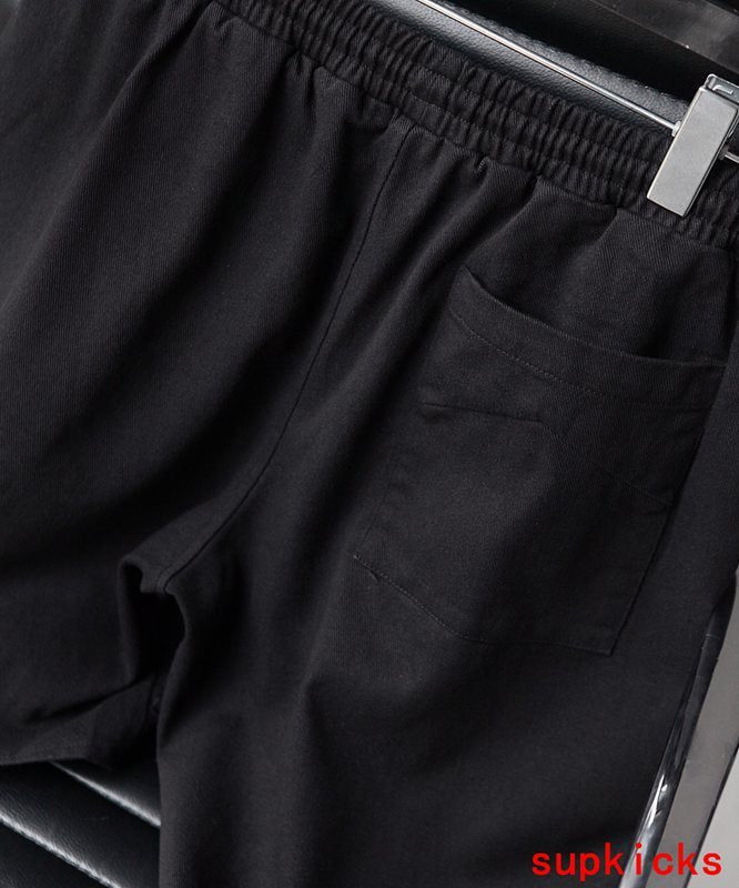 Close-up detail shot of Rhude luxury clothing with everyday silhouette