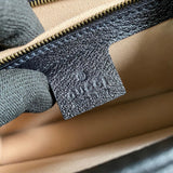Side profile of structured everyday-luxe women's handbag – women's designer-style accessory