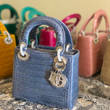 Handle and strap detail of everyday-luxe structured women's handbag – women's everyday handbag