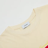 Side profile of Rhude luxury clothing with signature branding