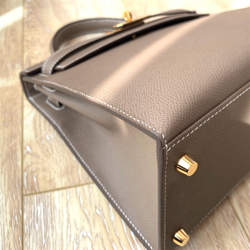  Curated handbag carried on shoulder