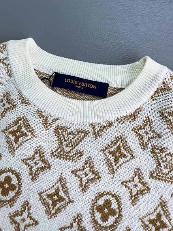Flat lay presentation of Louis Vuitton luxury clothing with monogram-inspired silhouette