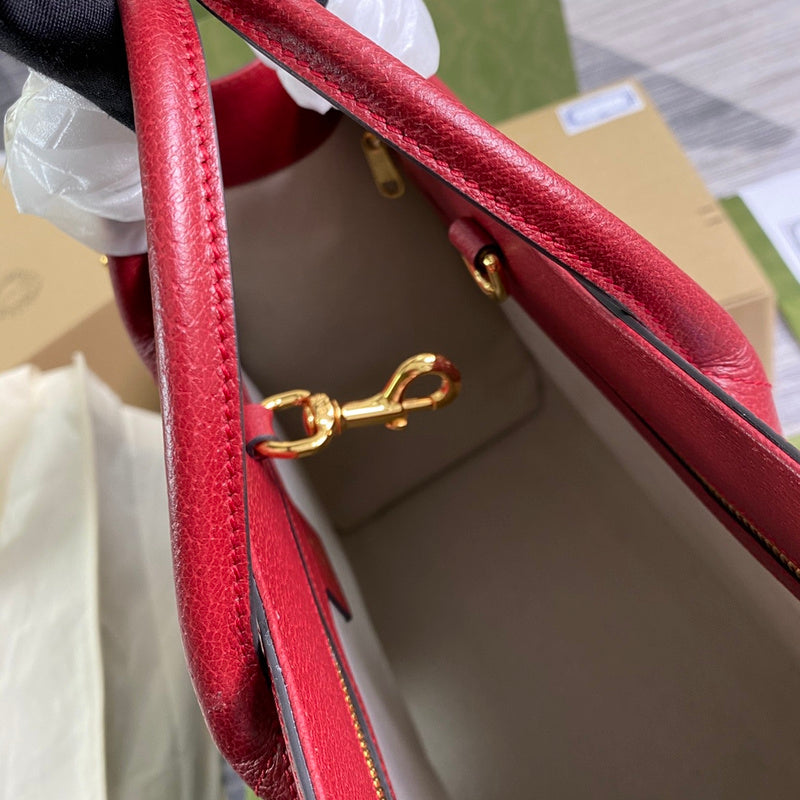 Back view of elevated sleek women's handbag – women's statement bag