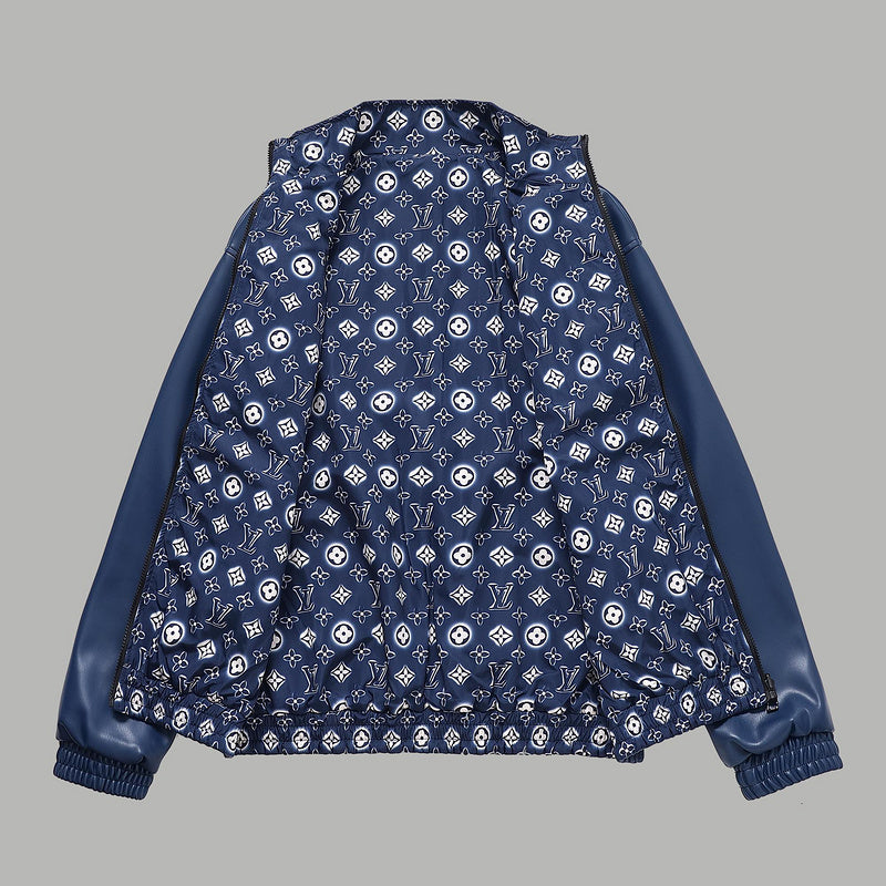 Close-up detail shot of Louis Vuitton luxury clothing with monogram-inspired silhouette