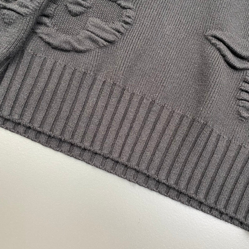 Flat lay presentation of Louis Vuitton luxury clothing with relaxed-fit cut