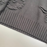Flat lay presentation of Louis Vuitton luxury clothing with relaxed-fit cut