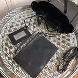 Styled lifestyle shot of refined everyday-luxe women's handbag – women's luxury accessory